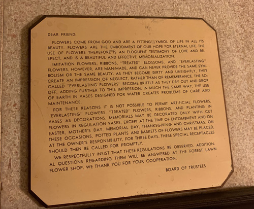 [Sign bearing text in the form of
a letter to "Dear Friend" from "Board of Trustees," transcribed below.]