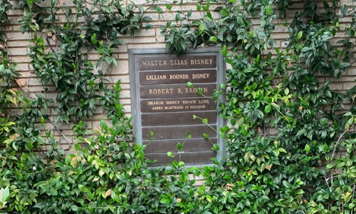 [Copper plates affixed to a
brick wall featuring the names "Walter Elias Disney," "Lillian Bounds Disney,"
"Robert B. Brown," and "Sharon Disney Brown Lund."]