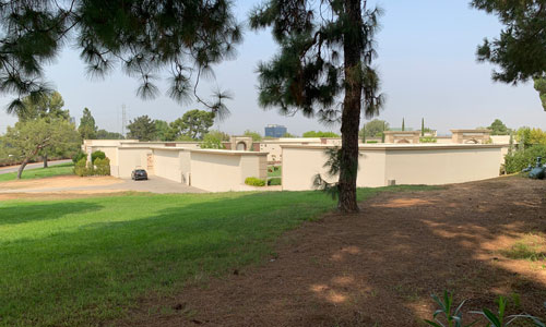 [View down toward a walled area
that appears to contain several courtyards.]