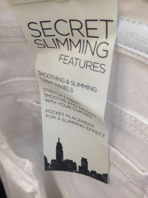 [Misc. photograph 54. Pair of jeans
advertising "secret slimming features": "Smoothing & slimming tummy
panels. Stretch fabric smooths and moves with your curves. Pocket placement for
a slimming effect."]